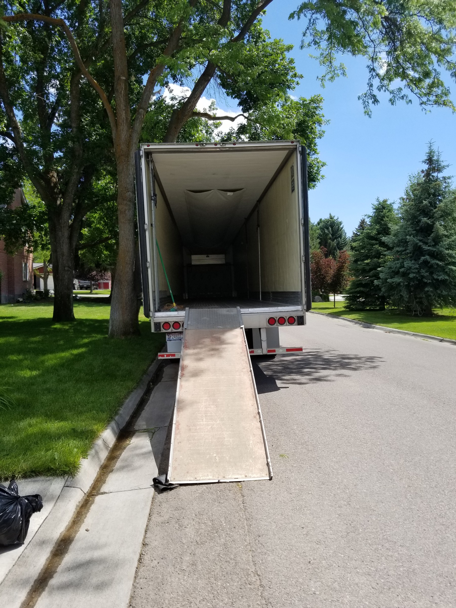 Empty moving trailer ready for a College Movers crew